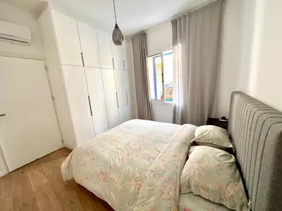 a bedroom with a bed and a window at Stasinou 52 in Limassol