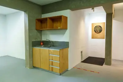 a kitchen with a counter and a sink in a room at Geo Panoramic Villa Konnos - Pool, Game Room, Gym in Protaras