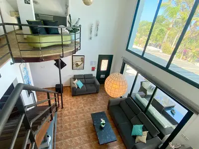an overhead view of a living room with a couch at Mediterranean View Villa in Protaras