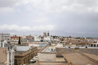 a view of a city from the roofs of buildings at Sky-view Hideaway in Nicosia
