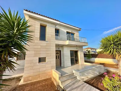 a large house with a balcony on top of it at Lovely Pool Villa in Pyla in Pyla