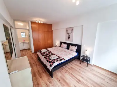 a bedroom with a bed in a room at CityCenter Apartment in Larnaka