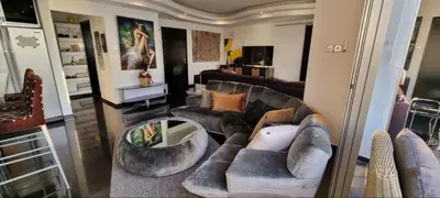 a living room with a couches and a couch at The View Beach Penthouse in Limassol