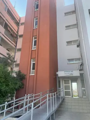 a building with a staircase in front of a building at Glamorous, Renovated 3-Bedroom Apt in Nicosia in Nicosia
