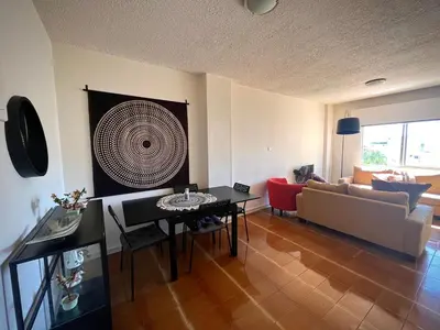 a living room with a couch and a table at 1BDR Affortable and Cozy Stay in Nicosia - Ioanni Polemi By Platform 357 in Nicosia