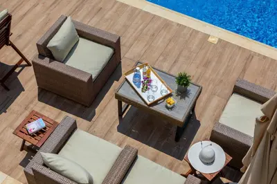 an overhead view of a table and chairs next to a pool at Napa Bay View Villa 8 in Ayia Napa