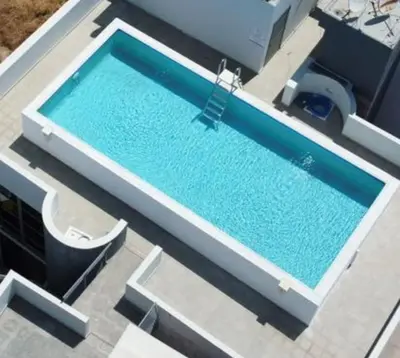 an overhead view of a large swimming pool at Alex Residence in Larnaka