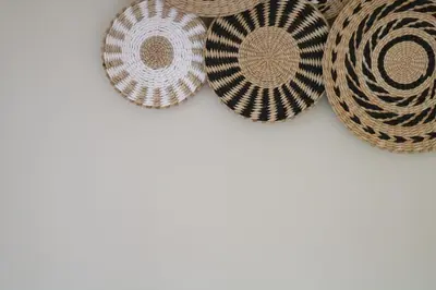 a group of three baskets on a wall at Thymises Boutique Hotel in Kakopetria