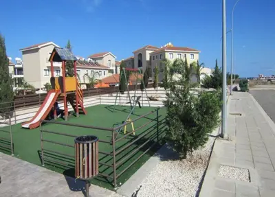 a playground with a slide at Protaras Villa Angela Nefeli in Paralimni