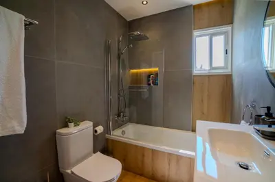a bathroom with a toilet and a shower and a sink at Perfect for families, Beach 3 Min away, Brand New in Limassol