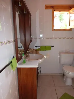 a bathroom with a sink and a toilet at The House of Pericles in Silikou