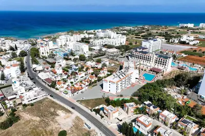 an aerial view of a city and the ocean at Villa Michaella - 500m from Golden Beach in Paralimni