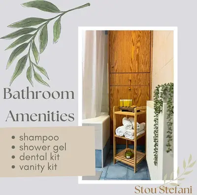 a bathroom with a shower and a shelf with towels at Stou Stefani in Agros