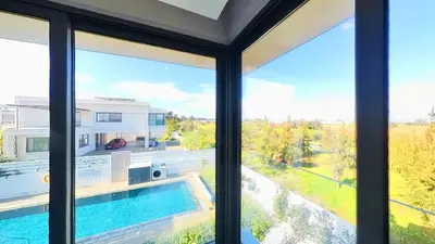 a view from the window of a house with a swimming pool at Billy's Place Protaras Luxury Villa with private pool with heated pool option for autumn and winter months in Paralimni