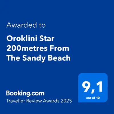 a blue sign with the words unavailable to overnight starriors from the sandy beach at Oroklini Star 200metres from the sandy beach in Larnaka