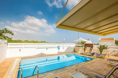 an image of a swimming pool in a house at Villa Cayenne in Protaras