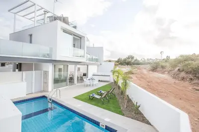 an image of a house with a swimming pool at Villa Prol24,brand New 2bdr Protaras Villa with Pool,close to Fig Tree Bay Beach in Protaras