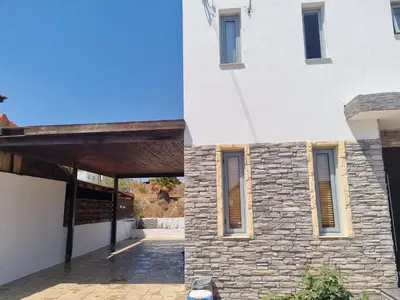 a renovation of a house with a stone facade at Impeccable 3-Bed Villa in Nicosia in Yukarı Lakatamya