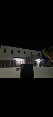 a building with a light on the side of it at Impeccable 3-Bed Villa in Nicosia in Yukarı Lakatamya