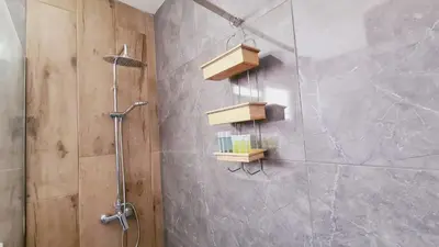 a bathroom with a shower with a glass shower stall at Nissi avenue 64 Studio 3 - Luxcyservices in Ayia Napa