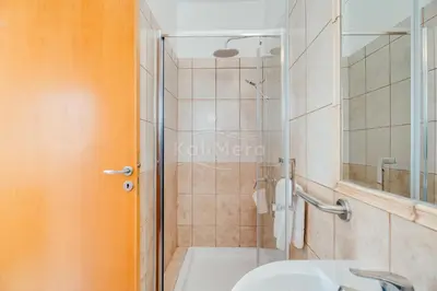 a bathroom with a shower and a sink at Villa Maddie in Protaras