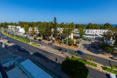 an aerial view of a street in a city at Modern seafront apartment in Limassol