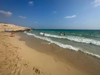 a group of people playing in the water at the beach at Viking Family Superior Lux in Ayia Napa