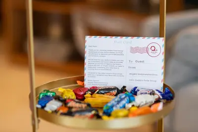 a sign sitting on top of a bowl of candy at Quattro Beachfront Sea View Ap 4 in Larnaka