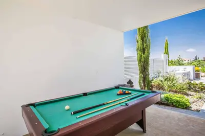 a pool table with cue balls on top of it at Protaras Greco Villa CCV1 in Protaras