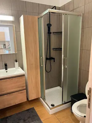 a bathroom with a shower with a toilet and a sink at Number 10 @ Coralli in Protaras