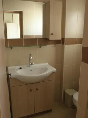 a bathroom with a sink and a toilet at St. Lazaros House in Larnaka