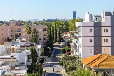 an aerial view of a city with buildings at Cosy Apart at Lykavitos in Nicosia