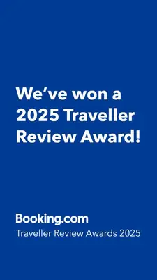 a blue sign that says weve won a traveler review award at Welcome to Thea Court in Paralimni