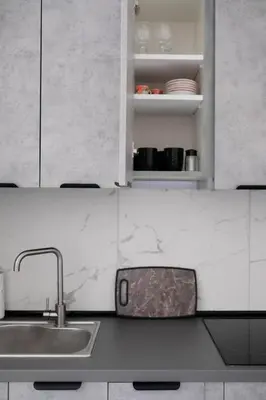 a kitchen with a sink and a counter top at Lima Residence in Nicosia