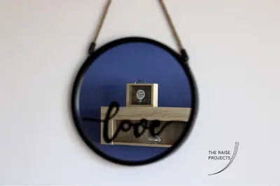a mirror with a picture and the word fool written on it at Raise Limassol Urban Escape in Limassol