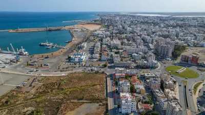 an aerial view of a city and the ocean at Stavri De'Lux Apartment in Larnaka