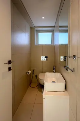 a bathroom with a sink and a toilet at City Napa Seaview Villas - Villa 8 in Ayia Napa