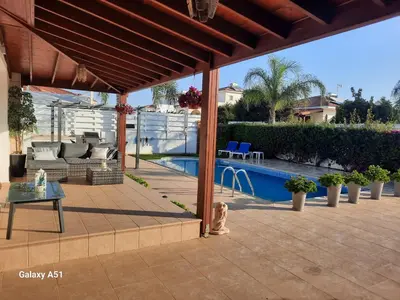 a patio with a pool in a house at Villa Niki in Ayia Napa