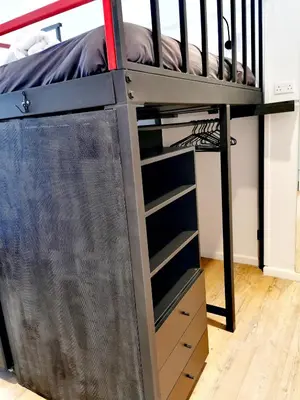 a bunk bed with drawers and a bunk bed frame at Unique City Centre Apartments in Nicosia