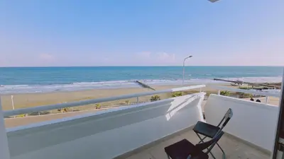 a balcony with a view of the beach at STAY Beach Wave Apartment in Larnaka