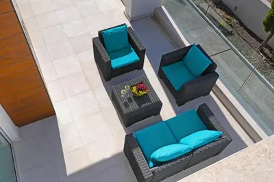 an overhead view of a patio with chairs and a table at Villa Indigo in Protaras