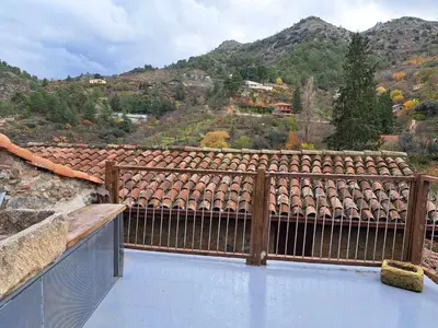 a balcony with a view of a mountain at PITHARIA in Askas