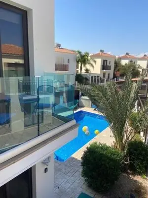 a view of a swimming pool from a building at Villa Ocean Breeze in Paralimni