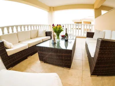 a living room with a couch and a table at 3 bed, Kapparis, Thea - 3A in Paralimni