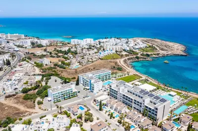 an aerial view of a city and the ocean at Studio in Protaras in Protaras
