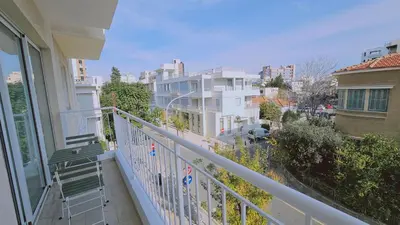 a balcony with a view of a city at STAY Cosmo City Suites in Nicosia