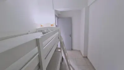 a ladder in a room with a white wall at STAY Finikoudes Soul in Larnaka