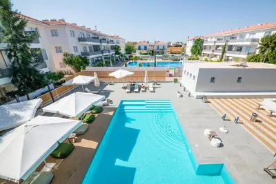 an overhead view of a swimming pool at a hotel at Apartament De Lux MS 1 - C in Paralimni
