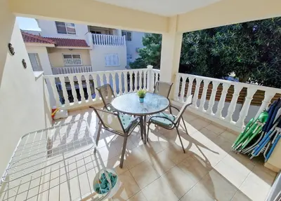 a patio with a table and chairs on a balcony at 3 bed, Kapparis, Thea - 3C in Paralimni