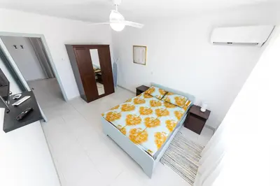 an overhead view of a bedroom with a bed at 2 bed, Kapparis, Trinidad - 2A in Paralimni